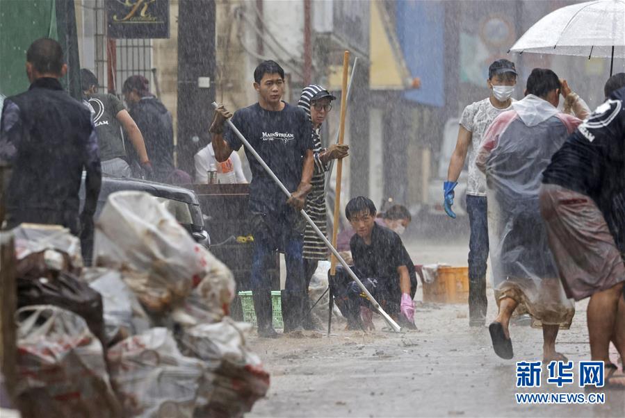 日本の九州豪雨の死者56人に