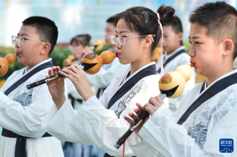 中國各地の幼稚園や學校で國慶節(jié)を祝う行事